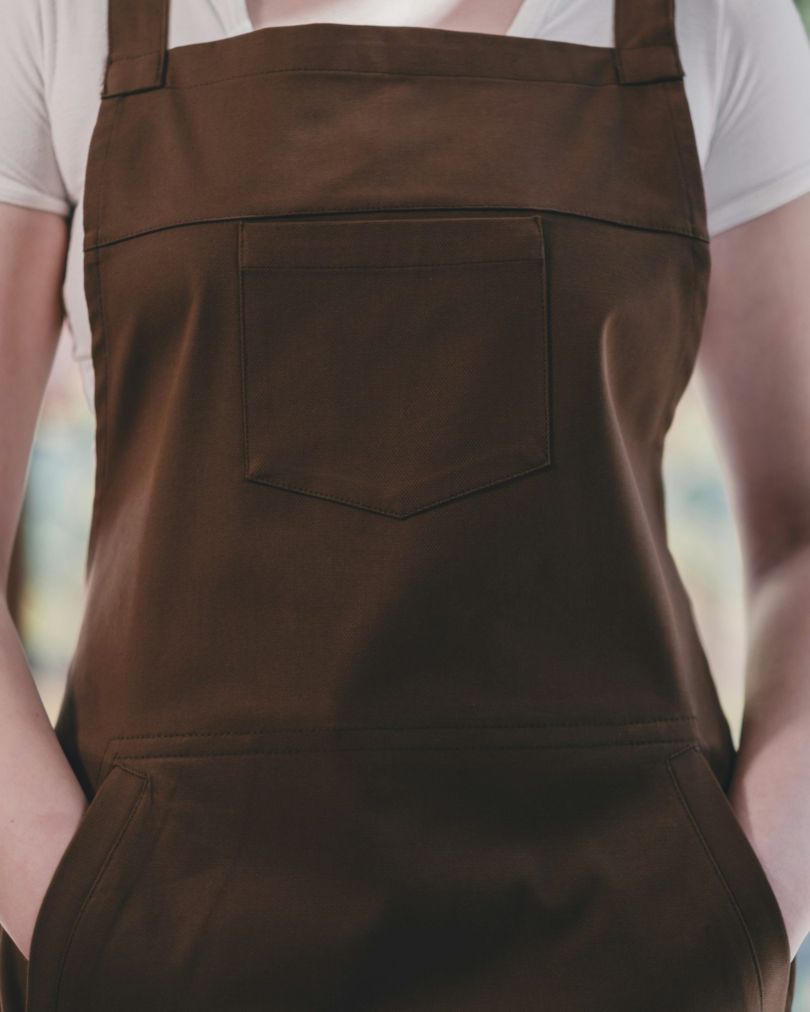 brown canvas bib apron with chest pocket